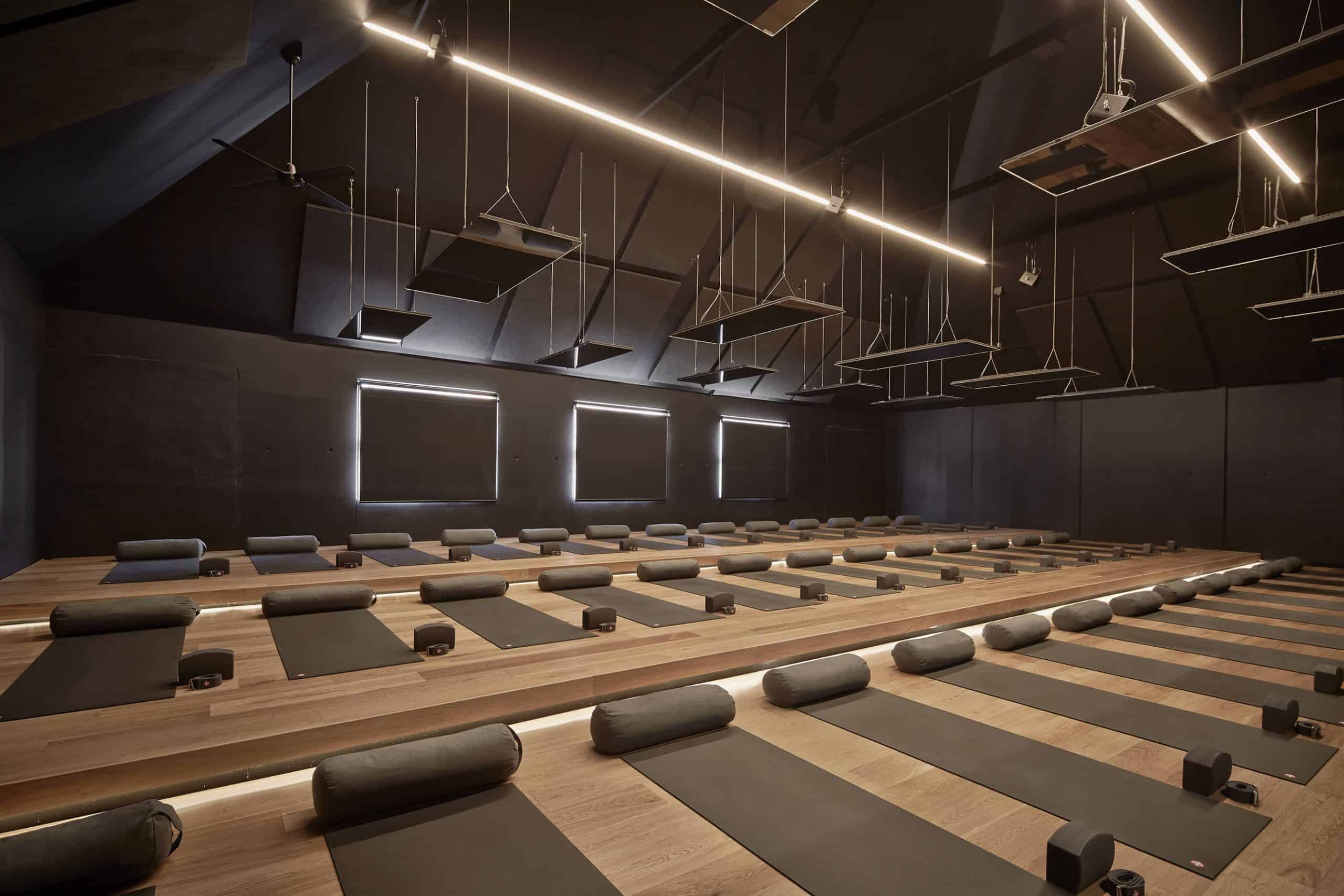 The Humming Puppy Yoga studio in Prahran with its lit ceiling and mat rows