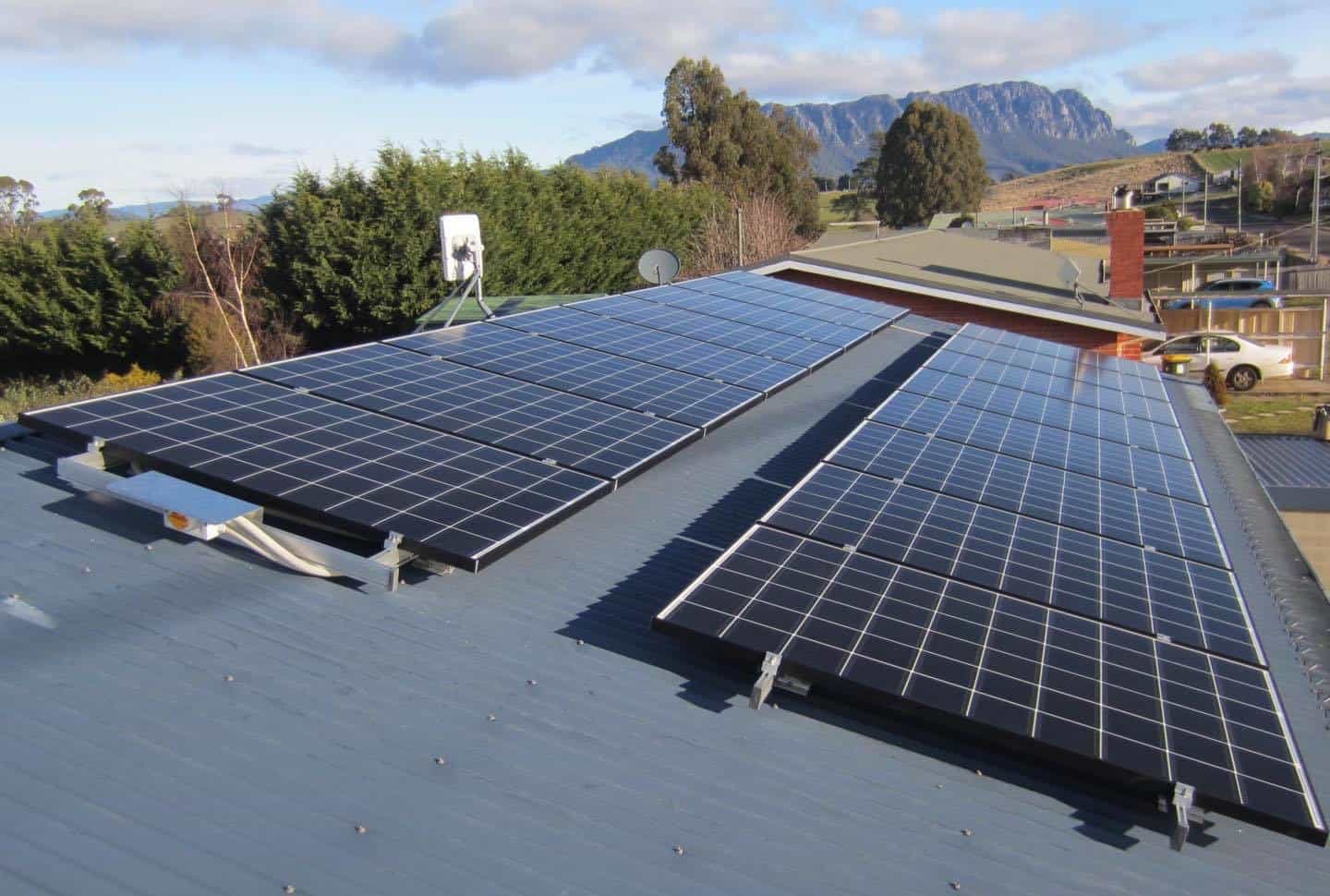 Roof top solar array looking out towards Mount Roland
