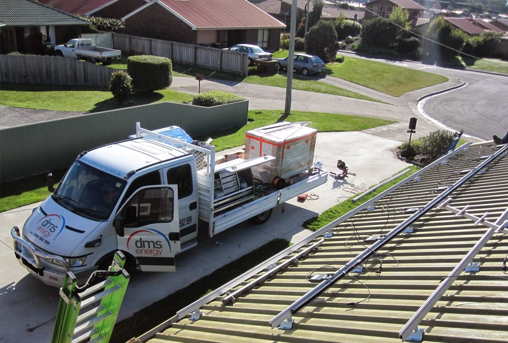 A DMS Energy service truck parked on site